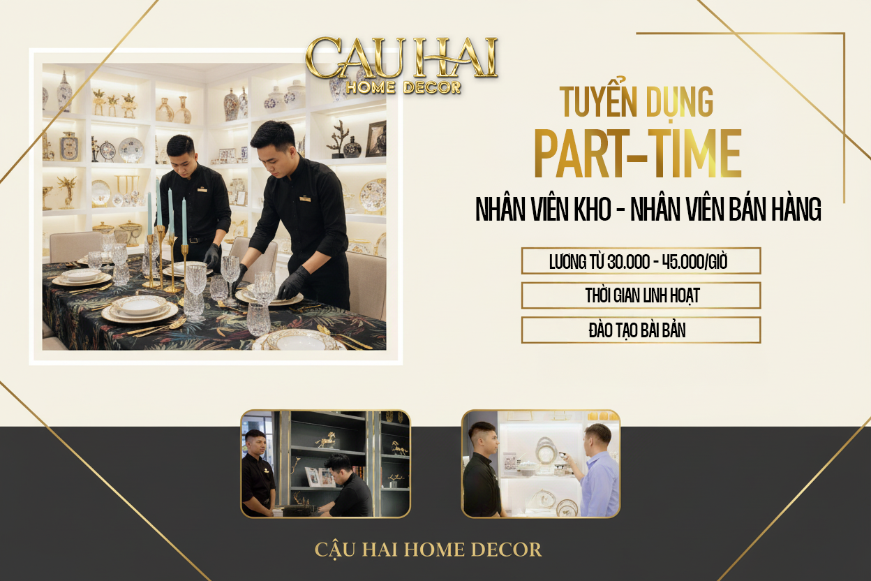 Hai nhân viên nam Cậu Hai Home Decor đang sắp xếp bàn ăn trong showroom sang trọng.