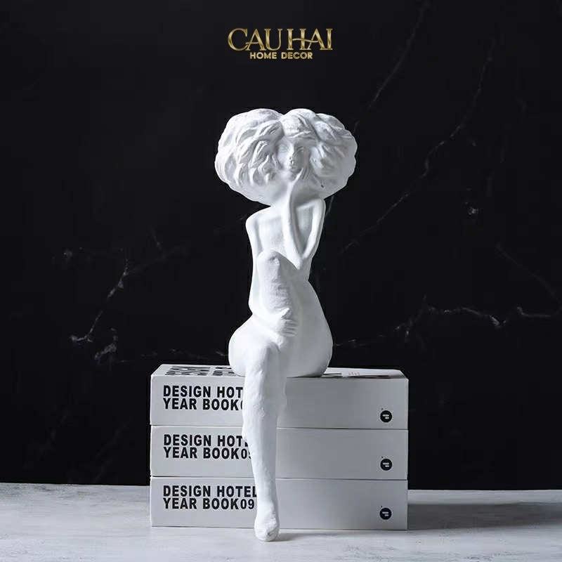 TƯỢNG CÔ GÁI LA MUSE SILENCIEUSE